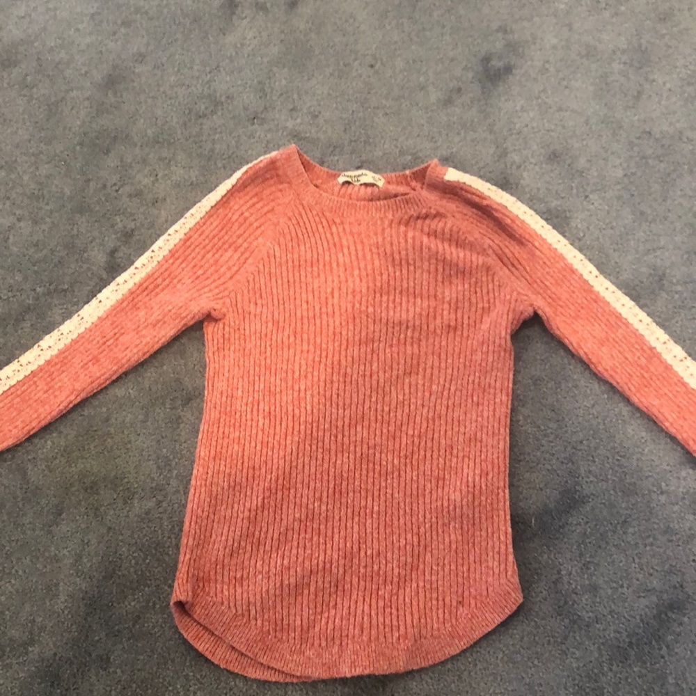 Pink sweater with flower detail